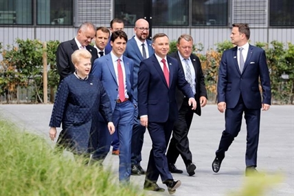 NATO emerges battered, bruised but still alive after tense summit | iNFOnews.ca