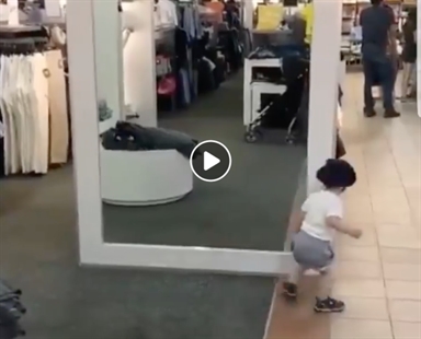 TRENDING NOW: Adorable little boy looks for the boy in mirror | iNFOnews.ca