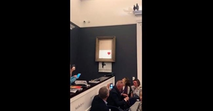 Banksy artwork self-destructs just after $1.4 million sale | iNFOnews.ca