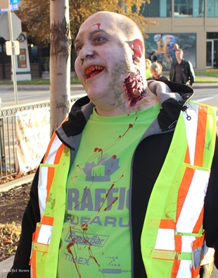 Zombies, costumed candy seekers take over downtown | iNFOnews.ca