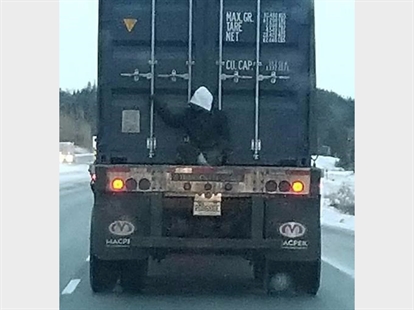 Quebec hitchhiker on back of transport truck left with hypothermia and possible fine | iNFOnews.ca