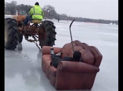 TRENDING NOW: Guy just relaxing on a couch pulled by tractor on a frozen lake | iNFOnews.ca TRENDING NOW: Guy just relaxing on a couch pulled by tractor on a frozen lake | iNFOnews.ca
