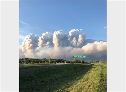 'Praying to God:' Man sings gospel as he watches his home burn in Alberta fire | iNFOnews.ca