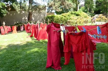 Red dresses hang in Vernon for Murdered and Missing Women Inquiry | iNFOnews.ca