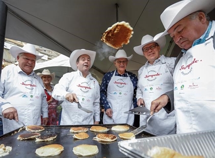UPDATE: 'Like-minded' premiers flip pancakes, talk politics on Calgary Stampede visit | iNFOnews.ca