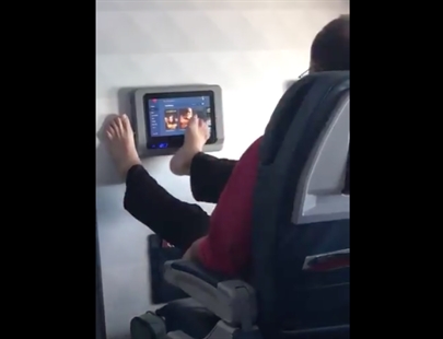 TRENDING NOW: Man caught operating airline TV with feet | iNFOnews.ca