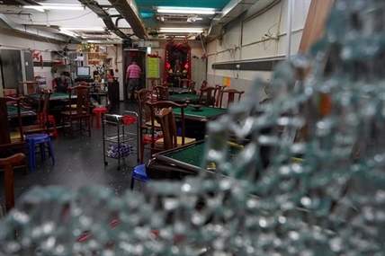 Hong Kong police draw guns in latest protest violence | iNFOnews.ca