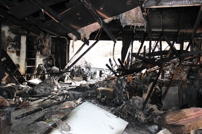 Vehicle fire guts garage, burns equipment at Duncan Avenue East home | iNFOnews.ca