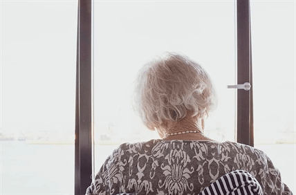 An old woman's head from behind.