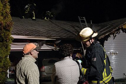 Neighbours alert father and son to house on fire | iNFOnews.ca