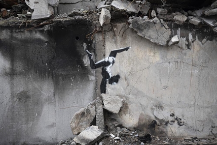 Amid the war ruins in Ukraine, Banksy seeds art | iNFOnews.ca Amid the war ruins in Ukraine, Banksy seeds art | iNFOnews.ca