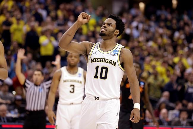Michigan delivers 3-point punch to knock out Oklahoma St. | iNFOnews.ca