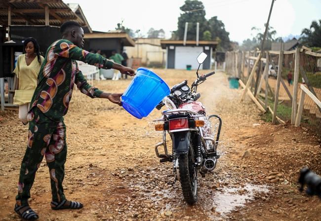In Congo, an Ebola survivor with a motorbike helps ease fear | iNFOnews.ca In Congo, an Ebola survivor with a motorbike helps ease fear | iNFOnews.ca