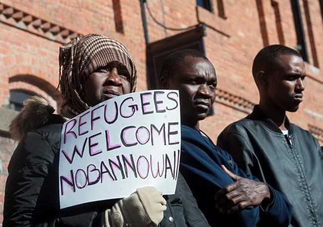 The Latest: Iraqi man braces for long absence from family | iNFOnews.ca