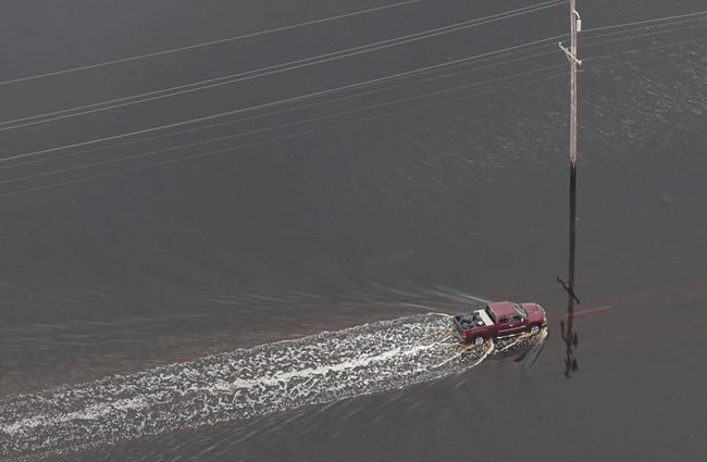 The Latest: Waste treatment plant disabled due to flooding | iNFOnews.ca