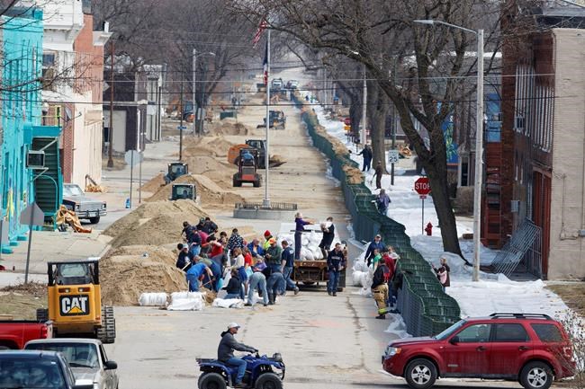 More evacuations in Midwest as floodwaters head downstream | iNFOnews.ca