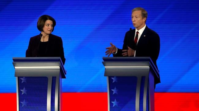 The Latest: Bloomberg isn't at debate, but he's name-dropped | iNFOnews.ca