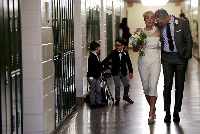 Couple weds in Jersey high school hall where they met | iNFOnews.ca