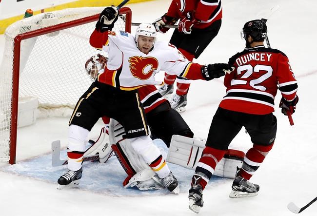 Brodie's career-high 4 assists help Flames blaze past Devils | iNFOnews.ca Brodie's career-high 4 assists help Flames blaze past Devils | iNFOnews.ca