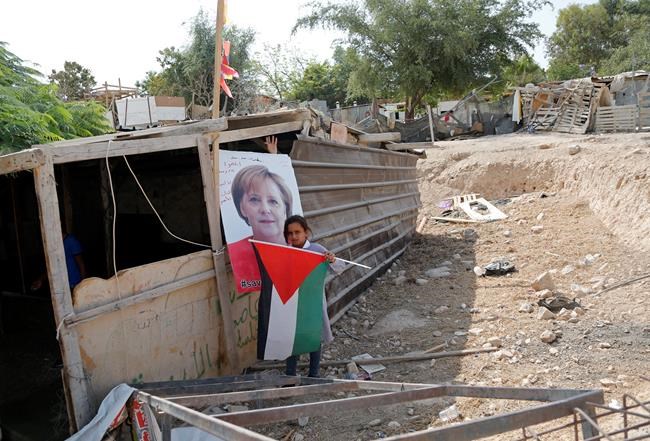 Palestinian students ask Merkel to protect their village | iNFOnews.ca Palestinian students ask Merkel to protect their village | iNFOnews.ca