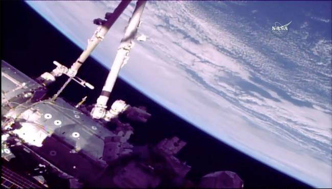 Spacewalking astronauts finish months of robot arm repair | iNFOnews.ca