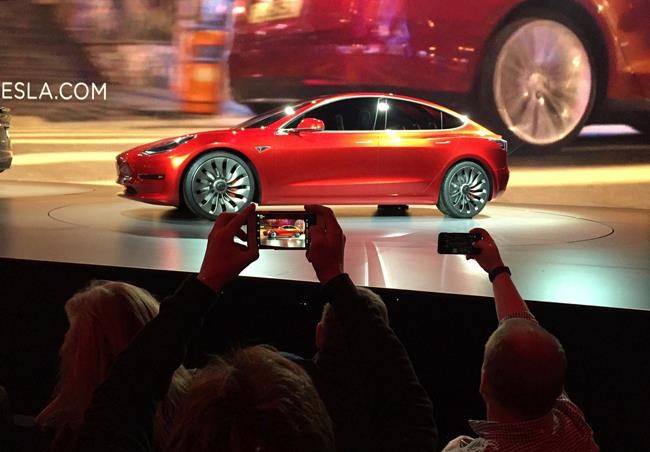 On the road to make an affordable car, Tesla cuts jobs | iNFOnews.ca On the road to make an affordable car, Tesla cuts jobs | iNFOnews.ca