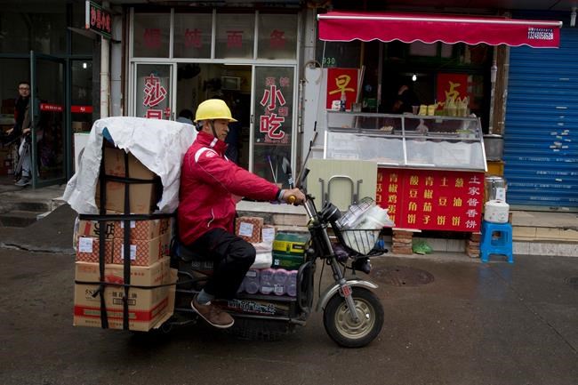 Wal-Mart to sell Chinese online business to retailer JD.com | iNFOnews.ca CP1173435973