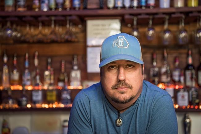 Americans divided over armed civilians who flock to protests | iNFOnews.ca