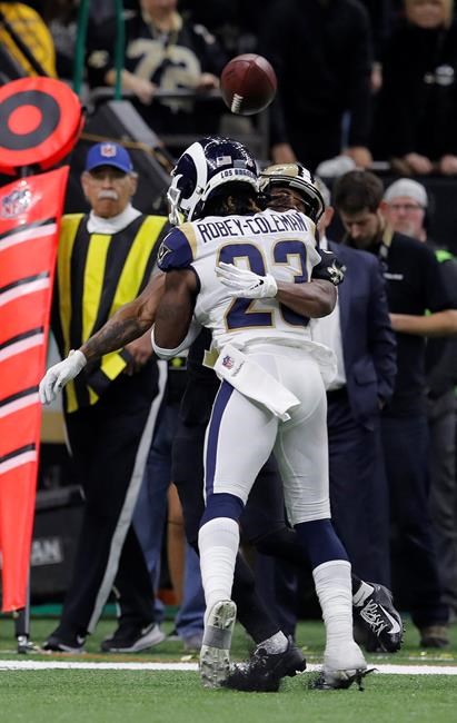 With voodoo dolls, cookies Saints fans protest missed call | iNFOnews.ca