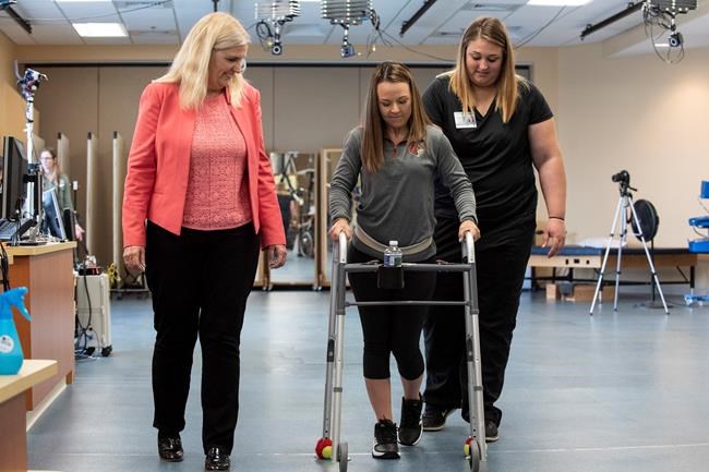 Implant, intense rehab help 3 paralyzed for years take steps | iNFOnews.ca
