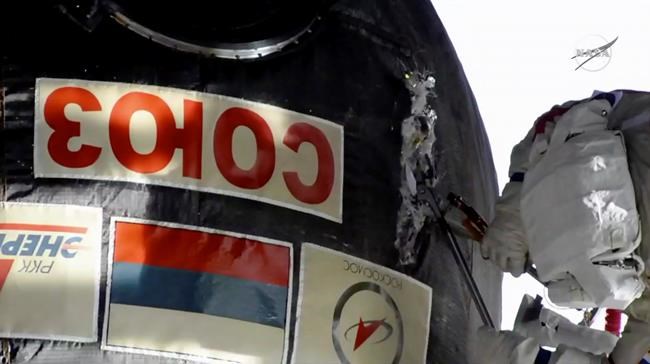 Spacewalking astronauts check site of capsule leak | iNFOnews.ca Spacewalking astronauts check site of capsule leak | iNFOnews.ca