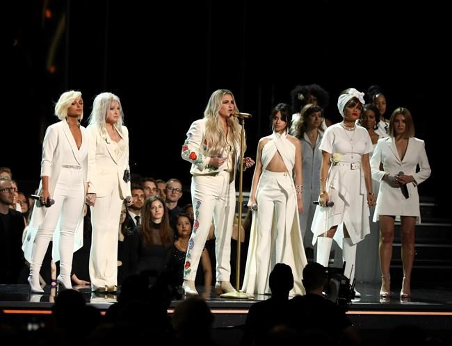 White roses, Kesha offer rallying cry for women at Grammys | iNFOnews.ca