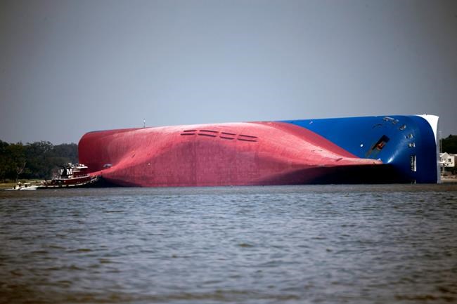 Salvage experts to haul overturned cargo ship away in pieces | iNFOnews.ca Salvage experts to haul overturned cargo ship away in pieces | iNFOnews.ca