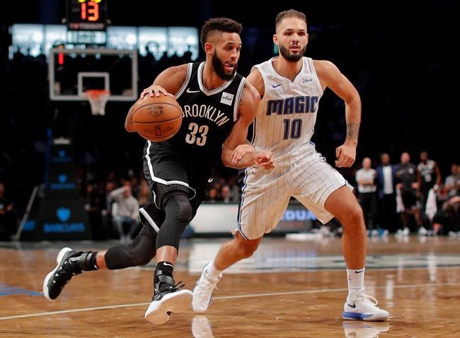 Nets' national anthem singer kneels to finish performance | iNFOnews.ca