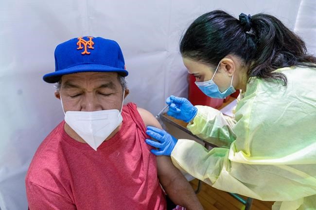 Latinos face barriers like fear, language in getting vaccine | iNFOnews.ca CP1149800289