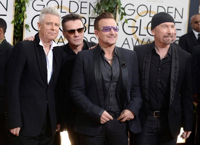 U2 bassist thanks band for helping him through addiction | iNFOnews.ca CP6440940