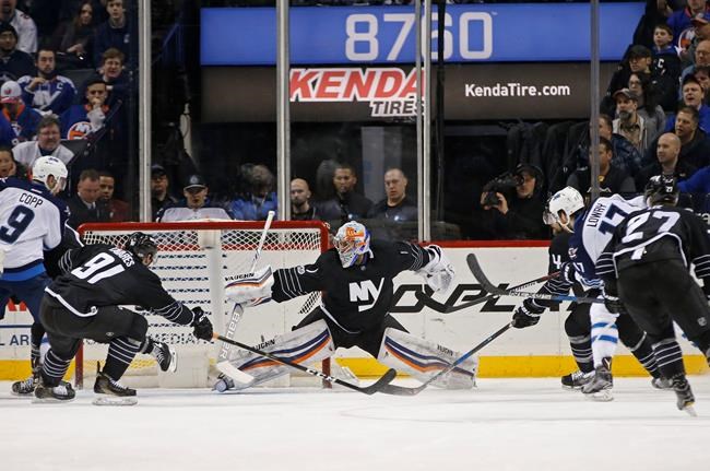 Little scores twice, Hellebuyck solid as Jets beat Isles 4-2 | iNFOnews.ca