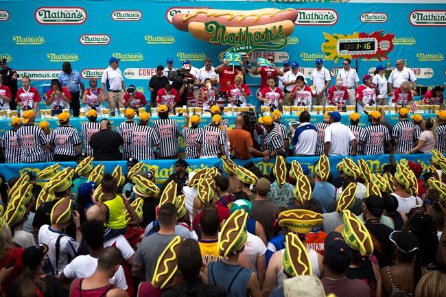 Joey Chestnut wins 10th title, gobbles a record 72 hot dogs | iNFOnews.ca