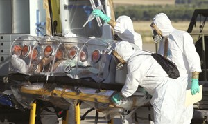 Health officials fear Ebola may become the new AIDS, but experts note many differences | iNFOnews.ca CP30330943