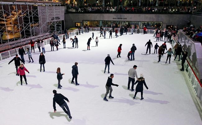 Skates (and masks) on! Rockefeller Center ice rink opens | iNFOnews.ca Skates (and masks) on! Rockefeller Center ice rink opens | iNFOnews.ca