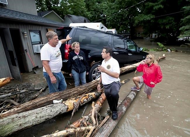 The Latest: Official: Residents trapped by flash flooding OK | iNFOnews.ca