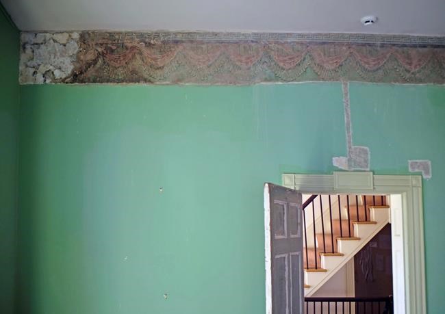 Hidden beneath paint, a famed artist's wall decorations | iNFOnews.ca