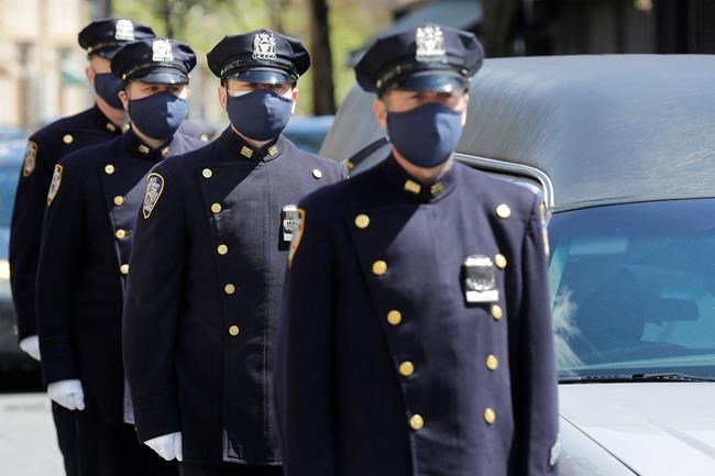 Masks, gloves, tears as NYPD mourns commander lost to virus | iNFOnews.ca Masks, gloves, tears as NYPD mourns commander lost to virus | iNFOnews.ca