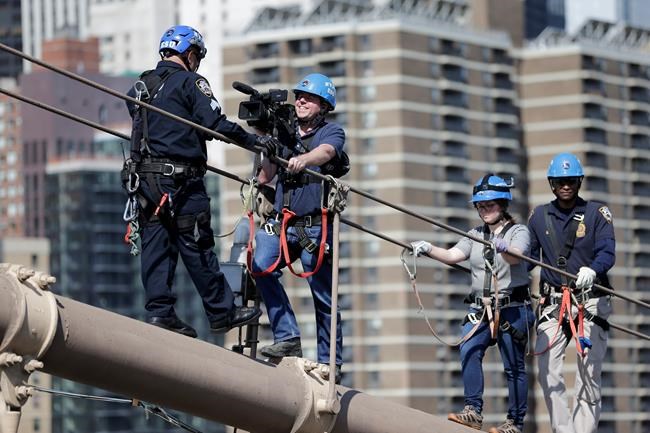 'I signed up for this?' Reporter scales Brooklyn Bridge | iNFOnews.ca