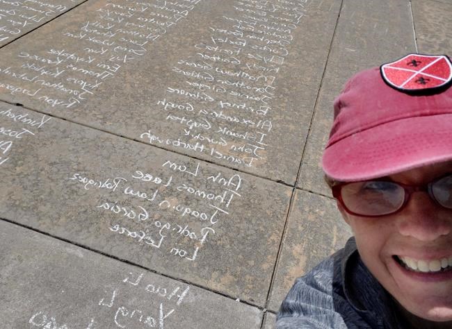 Where seniors would have walked to graduate, names in chalk | iNFOnews.ca