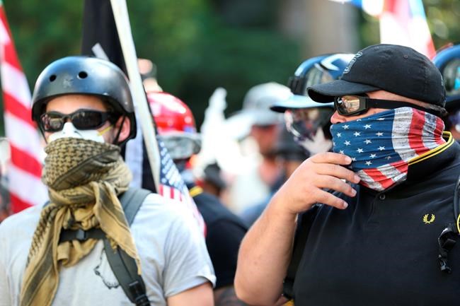 The Latest: Police report assaults at protest in Oregon | iNFOnews.ca