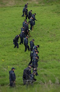 RCMP scour Moncton wooded area after suspect in Mountie shootings arrested | iNFOnews.ca