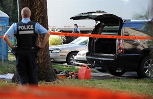 Police carry body out of site of PQ celebration | iNFOnews.ca CP20009287