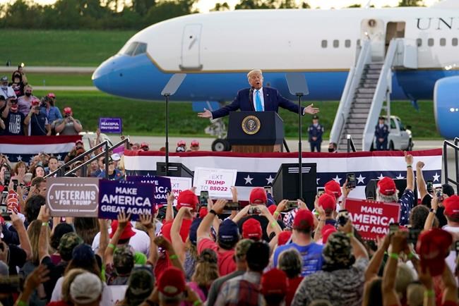 The Latest: Trump mocks the way Biden wears his mask | iNFOnews.ca