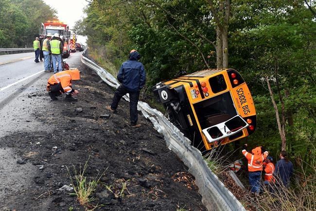 School bus lands on side in crash; minor injuries reported | iNFOnews.ca School bus lands on side in crash; minor injuries reported | iNFOnews.ca
